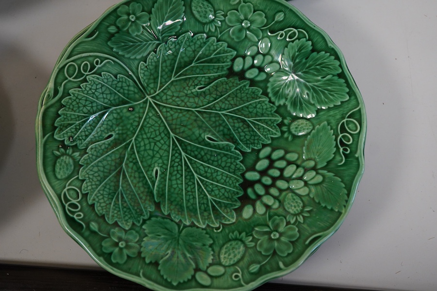 Quimper tableware (five) and eleven green-glazed leaf plates and similar dish- 17.5cm wide.